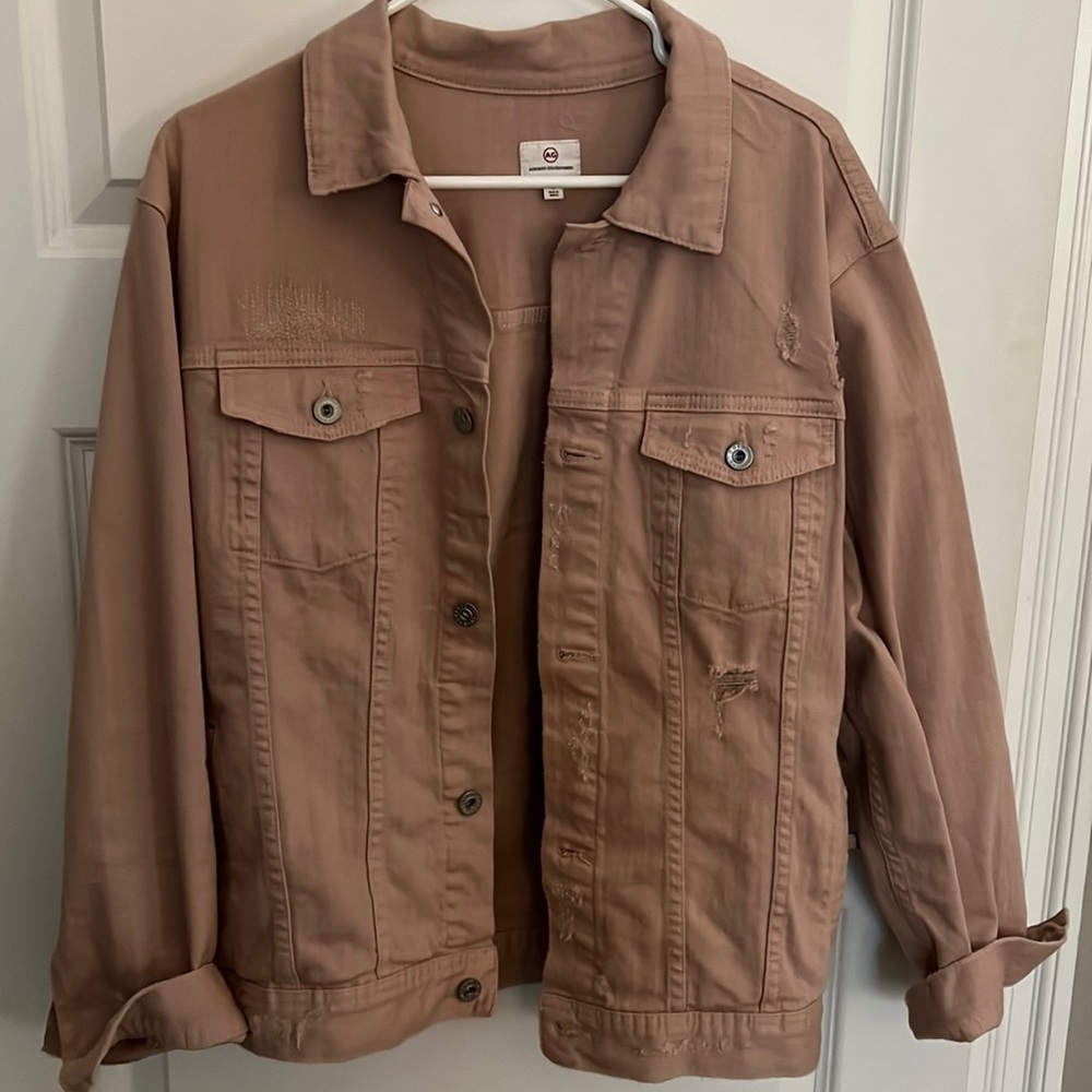 AG distressed denim jacket in blush/pink